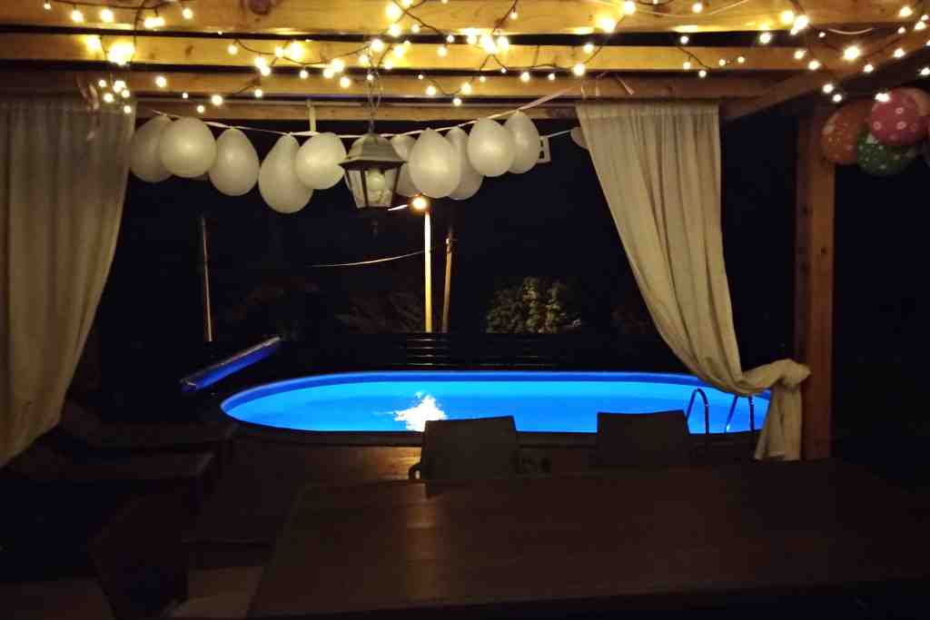 Section Deck Lighting and Decor above ground pool deck ideas on a budget image